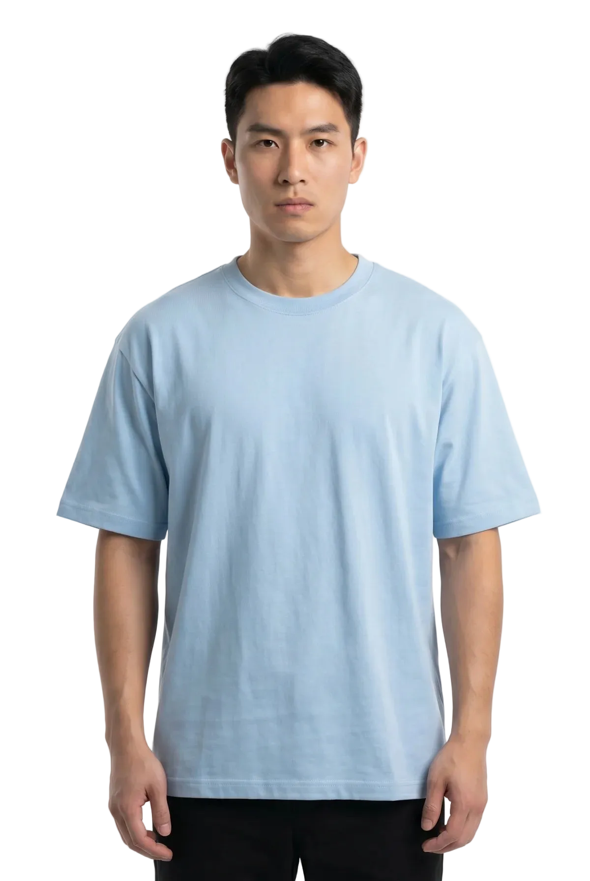 A man wearing a light blue crew-neck t-shirt and black pants, standing against a plain white studio background.