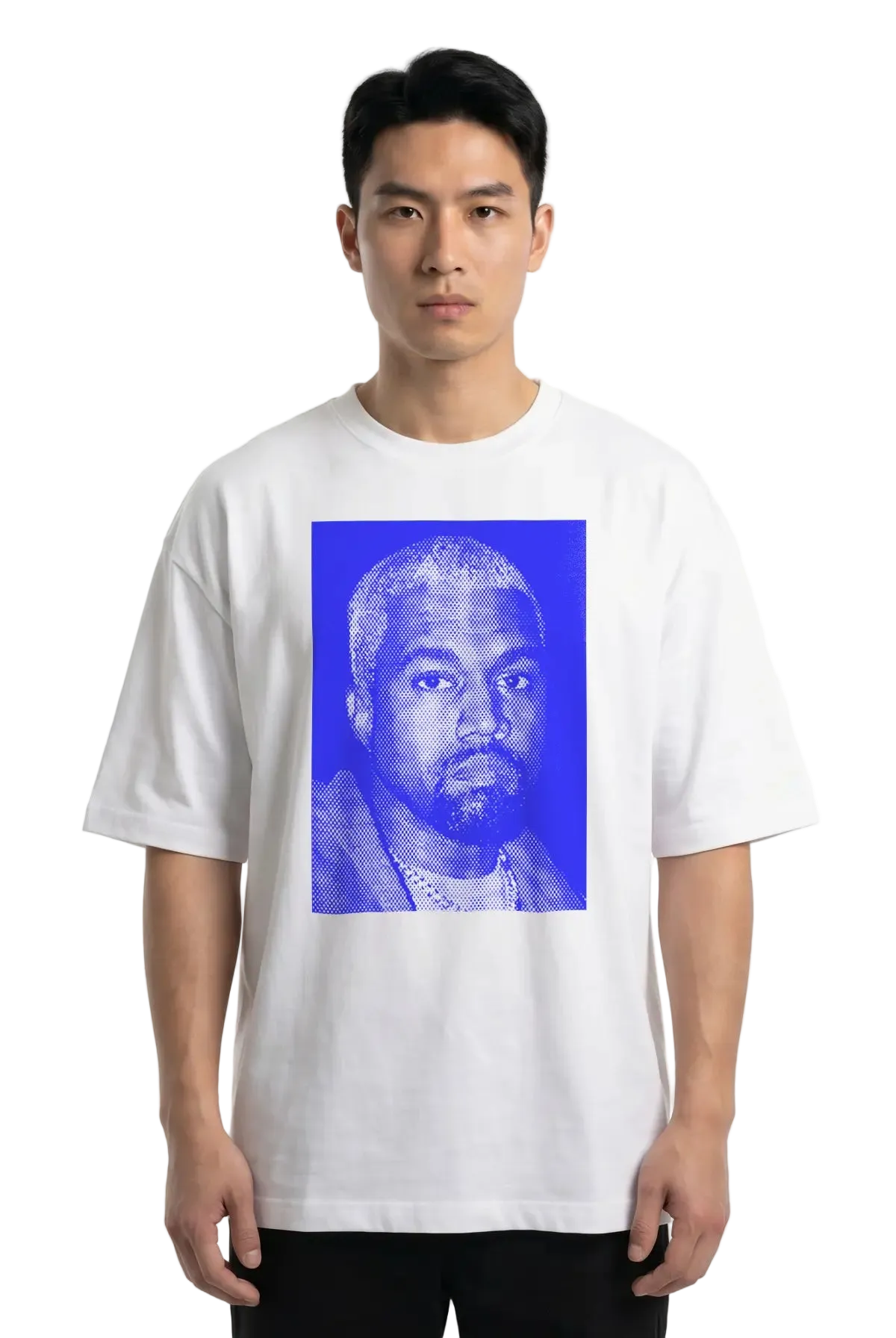 A man wearing a white short-sleeve t-shirt with a large blue graphic print of Kanye West on the front, photographed against a plain white studio background.
